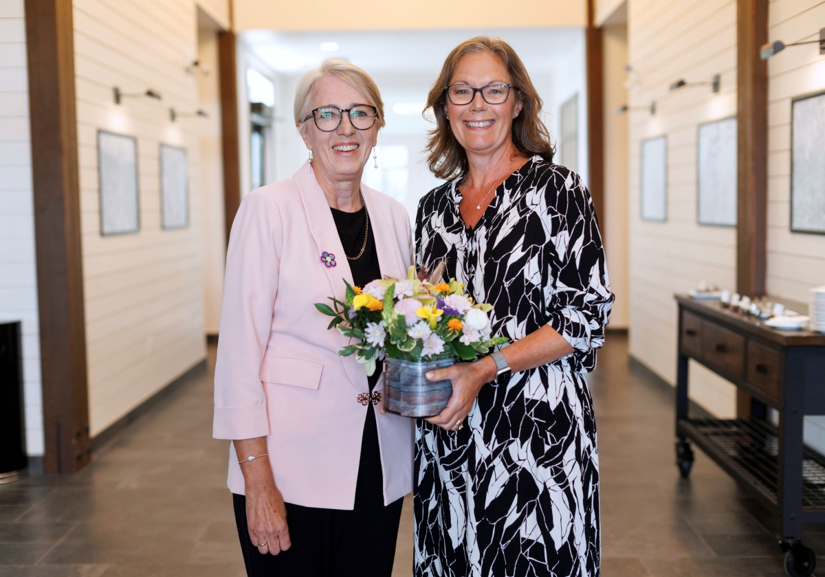 Solina Richter and Maxine Newton smiling for a photo.